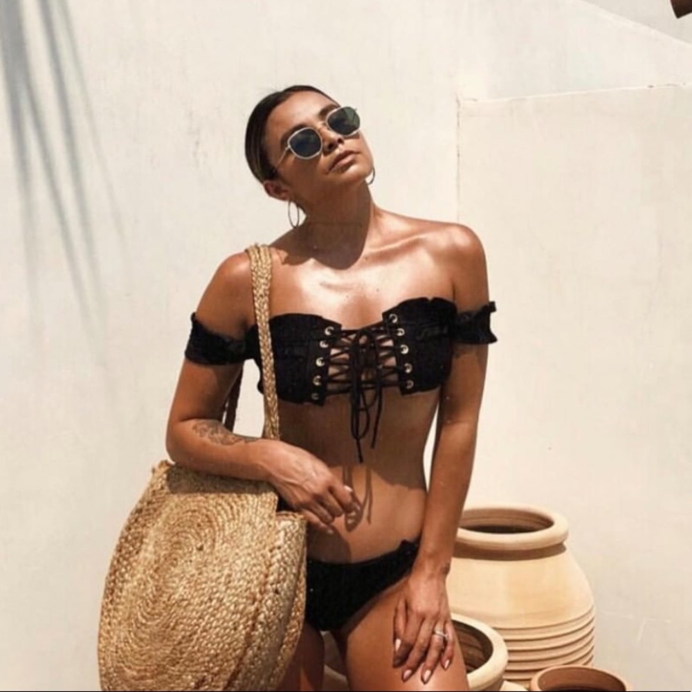 Black tie front smocked bikini with gold accents!